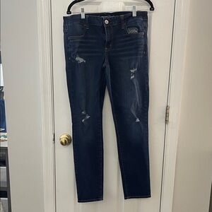 American Age Dark Indigo Skinny Jeans with Distressed Detailing